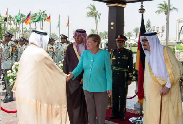 saudi arabia 039 s king salman bin abdulaziz al saud stands next to german chancellor angela merkel during a reception ceremony in jeddah saudi arabia photo reuters saudi arabia 039 s king salman bin abdulaziz al saud stands next to german chancellor angela merkel during a reception ceremony in jeddah saudi arabia photo reuters