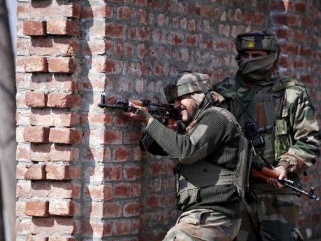 indian army soldiers take their positions near the site of a gun battle between indian security forces and militants on the outskirts of srinagar february 21 2016 photo reuters