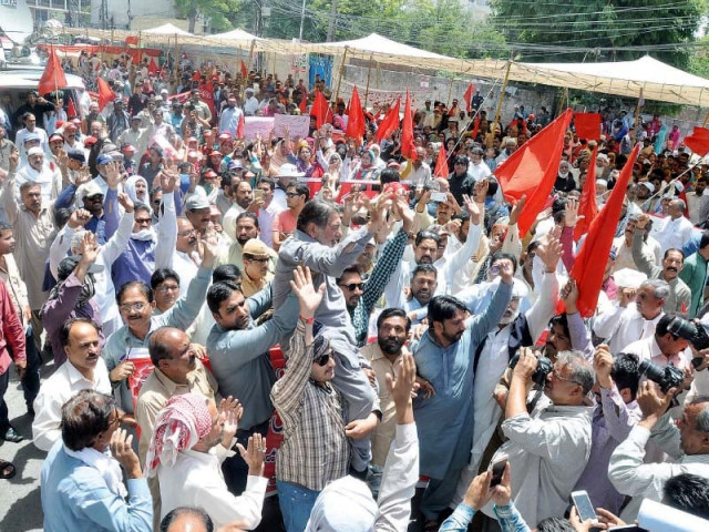 workers mark labour day by taking out a rally in front of the lahore press club photo abid nawaz express workers mark labour day by taking out a rally in front of the lahore press club photo abid nawaz express