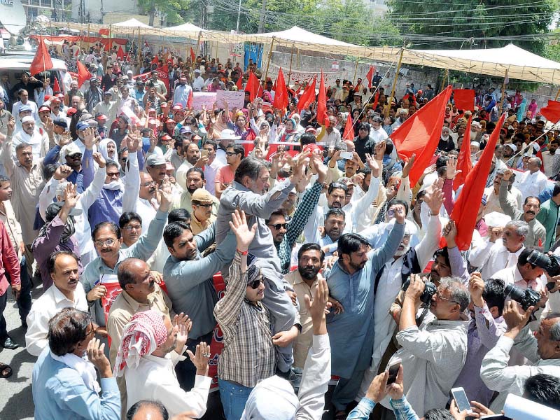 workers mark labour day by taking out a rally in front of the lahore press club photo abid nawaz express