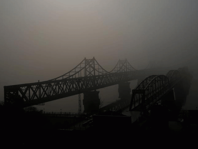 the friendship and the broken bridges over the yalu river connecting the north korean town of sinuiju and dandong in china 039 s liaoning province april 16 2017 photo reuters the friendship and the broken bridges over the yalu river connecting the north korean town of sinuiju and dandong in china 039 s liaoning province april 16 2017 photo reuters
