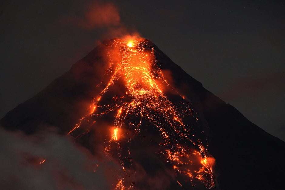 Lave flows from Mayon volcano at it continues to erupt as seen from Legazpi in Albay province, south of Manila. PHOTO: AFP