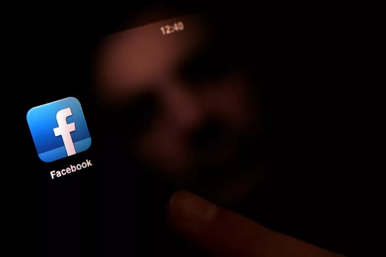 file photo a man uses an ipad with a facebook app in this photo illustration in sofia bulgaria on january 30 2013 photo reuters file photo a man uses an ipad with a facebook app in this photo illustration in sofia bulgaria on january 30 2013 photo reuters