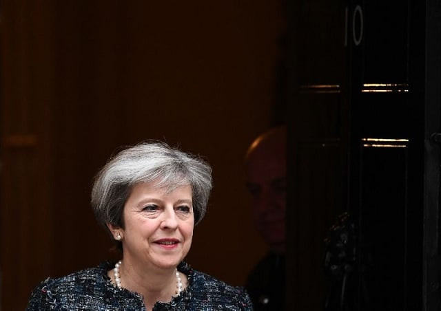 prime minister theresa may leaves 10 downing street bound for buckingham palace for an audience with queen elizabeth ii to mark the dissolution of parliament photo afp prime minister theresa may leaves 10 downing street bound for buckingham palace for an audience with queen elizabeth ii to mark the dissolution of parliament photo afp