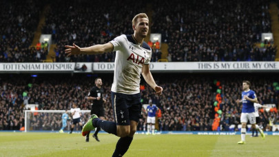 kane looks to pile pressure on league leaders chelsea
