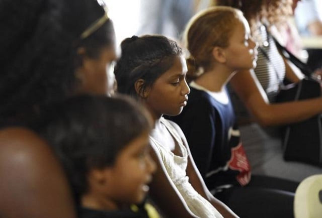 children attend a church service for eight children who were killed photo reuters children attend a church service for eight children who were killed photo reuters