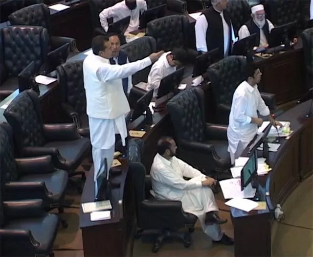 pti lawmaker demands payment of royalty to kohat standing on desk women lawmakers demand farman s disqualification an express news screengrab pti lawmaker demands payment of royalty to kohat standing on desk women lawmakers demand farman s disqualification an express news screengrab