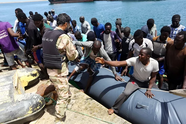 illegal migrants who were rescued by the libyan coastguard in the mediterranean sea off the libyan coast arrive at the naval base in the capital tripoli on may 6 2017 photo afp illegal migrants who were rescued by the libyan coastguard in the mediterranean sea off the libyan coast arrive at the naval base in the capital tripoli on may 6 2017 photo afp