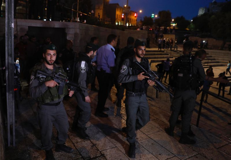 israeli border guards secure the scene of a reported stabbing attack by a female palestinian at damascus gate a main entrance to jerusalem 039 s old city photo afp