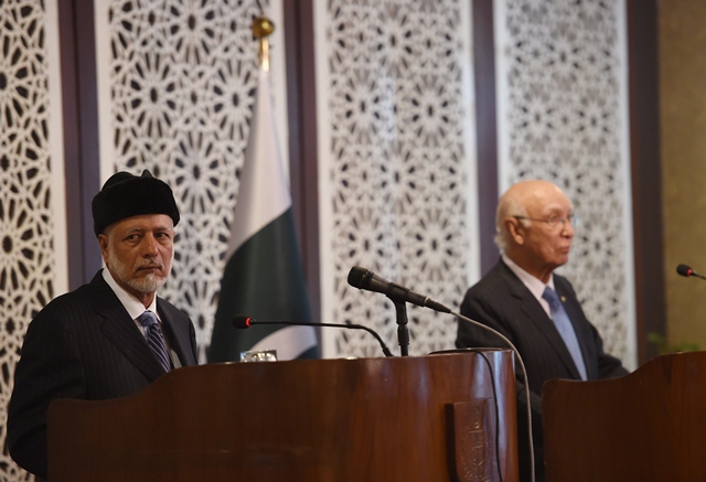 adviser to prime minister on foreign affairs sartaj aziz and minister for foreign affairs of oman yousuf bin alawi bin abdulla address a press conference in islamabad photo afp