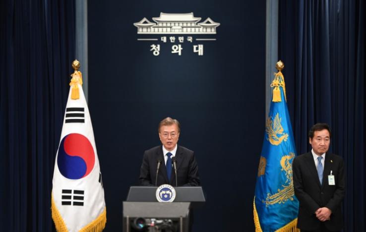 south korea 039 s new president moon jae in speaks as prime minister nominee lee nak yon r listens to during a press conference at the presidential blue house in seoul on may 10 2017 photo reuters