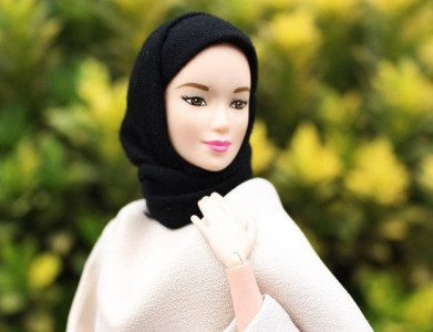 women create muslim headscarves for barbie dolls