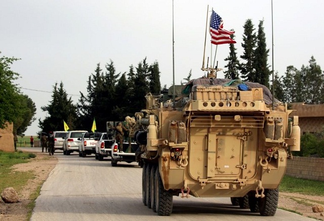 us forces accompanied by kurdish people 039 s protection units fighters near the northern syrian village of darbasiyah on the border with turkey photo afp