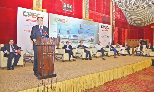 planning minister ahsan iqbal addresses a seminar on cpec organised by express media group in lahore photo waseem niaz express