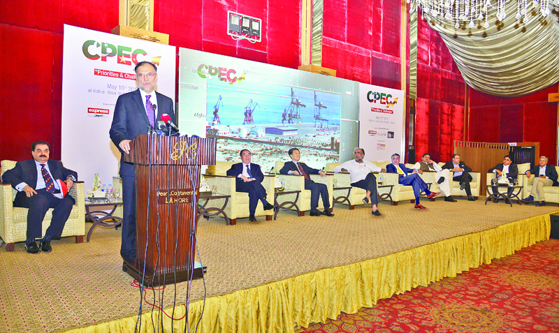 planning minister ahsan iqbal addresses a seminar on cpec organised by express media group in lahore photo waseem niaz express