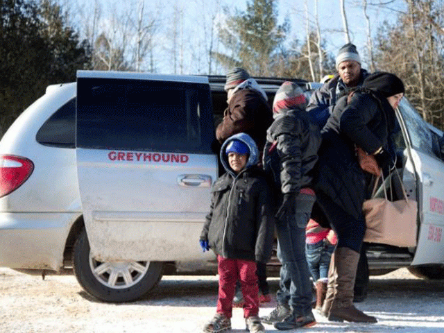 a family which claimed to be from sudan piles out of a northern taxi which drove them to the us canada border in champlain new york us february 17 2017 photo reuters a family which claimed to be from sudan piles out of a northern taxi which drove them to the us canada border in champlain new york us february 17 2017 photo reuters