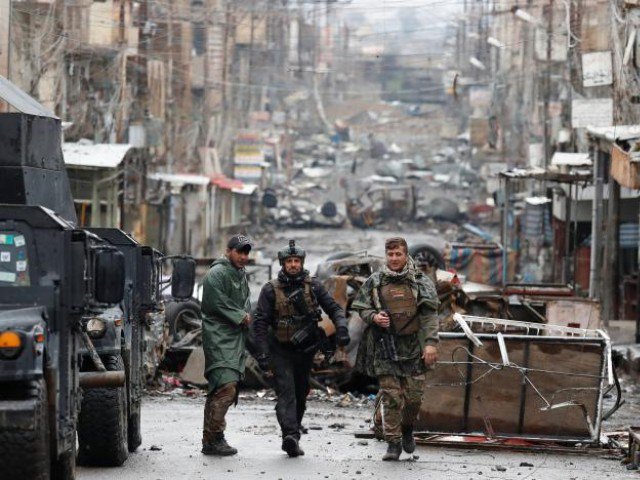 iraqi special forces soldiers walk in a street in mosul iraq march 4 2017 photo reuters