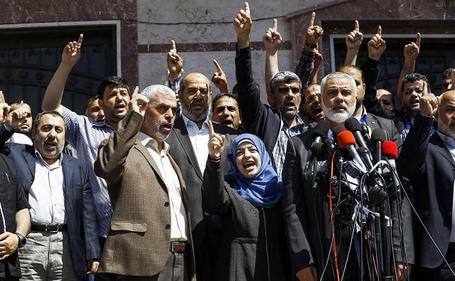 hamas leader ismail haniyeh with others during a press conference in gaza city on may 11 photo afp hamas leader ismail haniyeh with others during a press conference in gaza city on may 11 photo afp