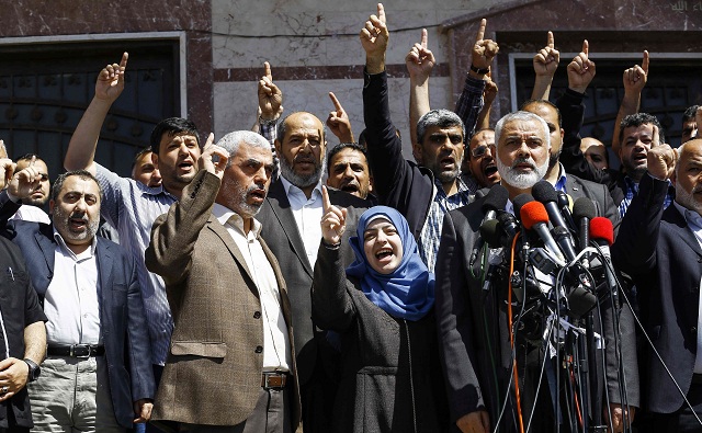 hamas leader ismail haniyeh with others during a press conference in gaza city on may 11 photo afp