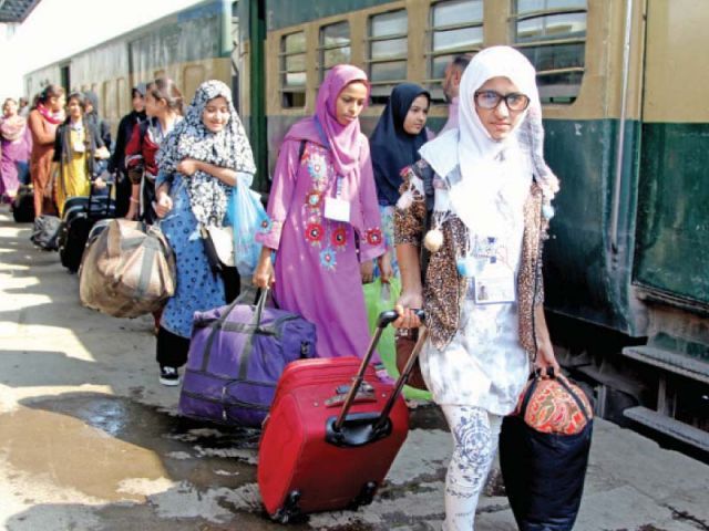 a group of 50 girls from lyari left for islamabad from cantt railway station on monday morning to attend a week long training at the national headquarters photo express