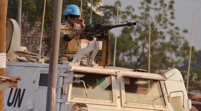 a moroccan peacekeeper from the united nations mission in the central african republic minusca patrols in bangui ahead the country presidential elections photo afp