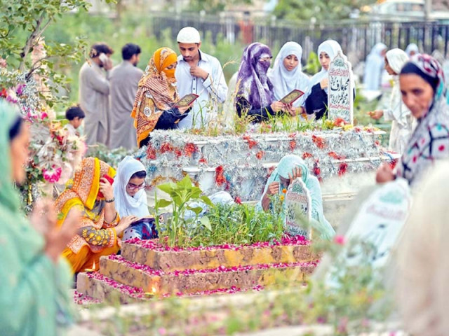 people visit a graveyard on shab e baraat photo afp people visit a graveyard on shab e baraat photo afp
