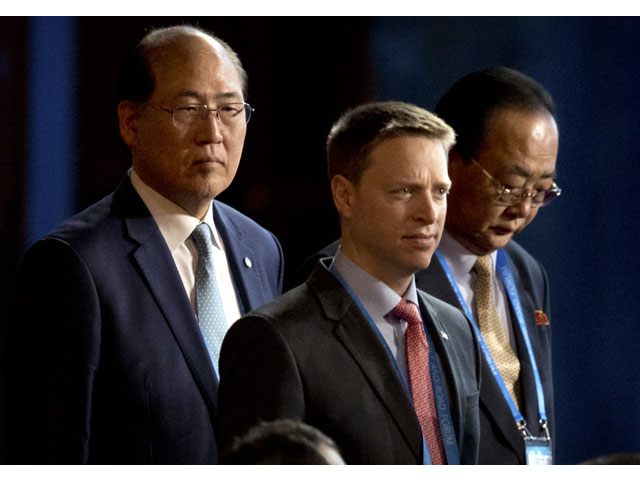 matt pottinger special assistant to us president donald trump and national security council nsc senior director for east asia c and kim yong jae north korea 039 s minister of external economic relations r arrive for the opening ceremony of the belt and road forum at the china national convention center cncc in beijing on may 14 2017 photo afp