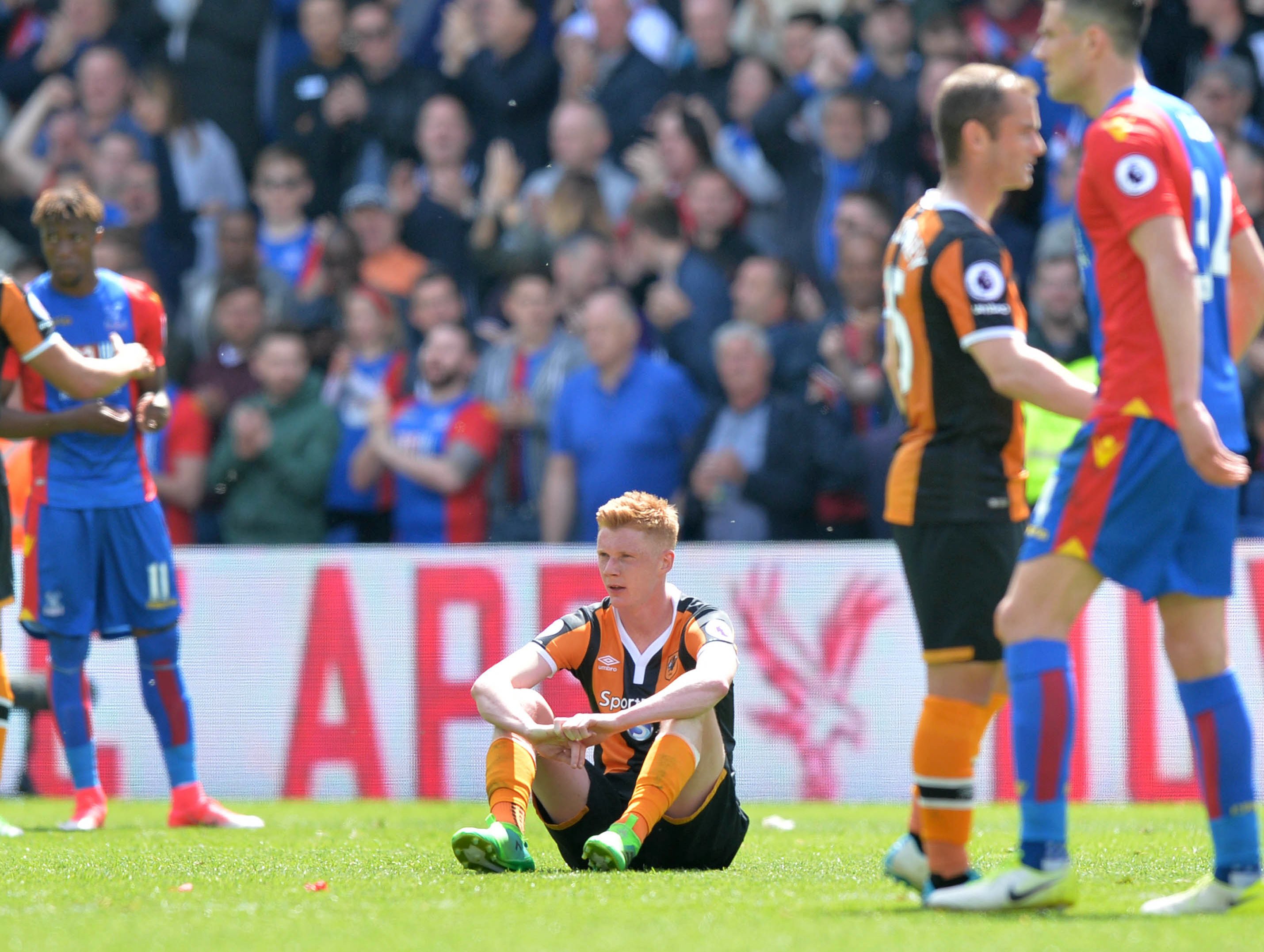 hull city 039 s english midfielder sam clucas c reacts at the close of the english premier league football match between crystal palace and hull city at selhurst park in south london on may 14 2017 photo afp