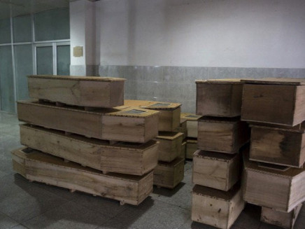 village in naushero feroze receives nine caskets photo reuters