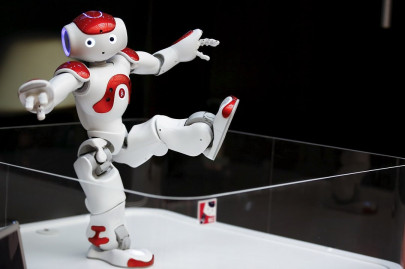 desperately short of labour mid sized japanese firms plan to buy robots