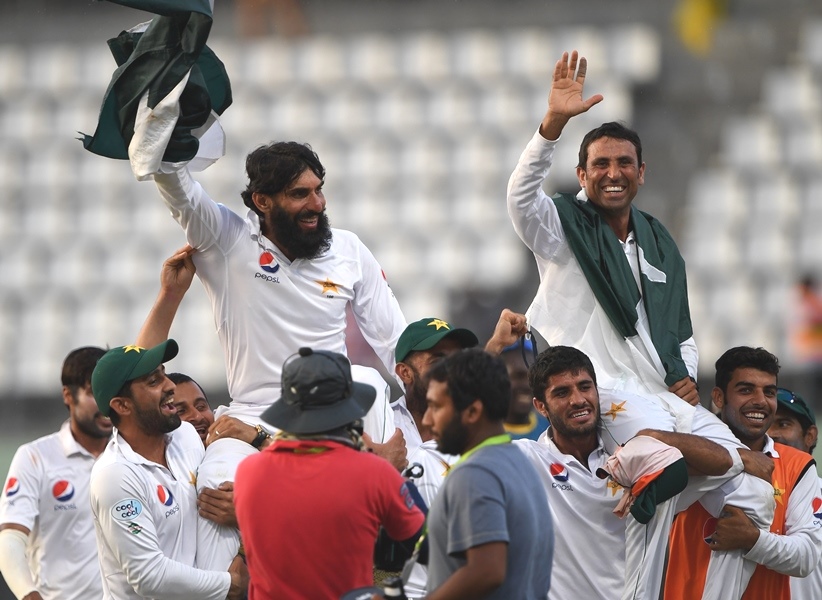 retiring pakistan cricket team members captain misbah ul haq l and younis khan r are carried by teammates as they celebrate after winning the final test match and the series 2 1 against the west indies at the windsor park stadium in roseau dominica on may 14 2017 photo afp