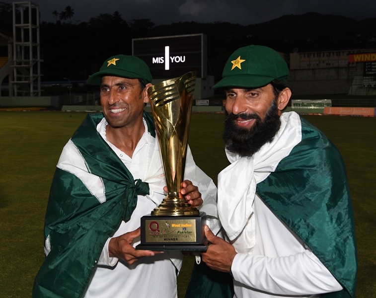 retiring pakistan cricket team members younis khan l and captain misbah ul haq r celebrate with the series trophy after winning the final test match and the series 2 1 against the west indies at the windsor park stadium in roseau dominica on may 14 2017 photo afp