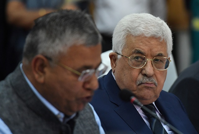 palestinian president mahmoud abbas r listens to a speech by indian junior minister for electronics and information technology p p chaudhary l during his visit to the centre for development of advanced computing in noida on may 15 2017 photo afp