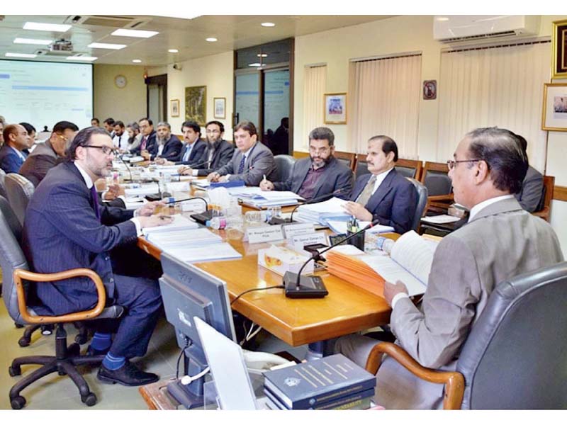 nab chairman qamar zaman chaudhry chairing a meeting of all wings of the bureau at nab headquarters photo express