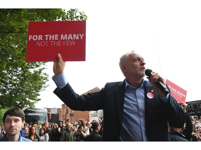 britain 039 s main opposition labour party leader jeremy corbyn delivers a speech to a crowd in leeds northern england on may 15 2017 as he campaigns for the general election britain 039 s main opposition labour party leader jeremy corbyn delivers a speech to a crowd in leeds northern england on may 15 2017 as he campaigns for the general election photo afp