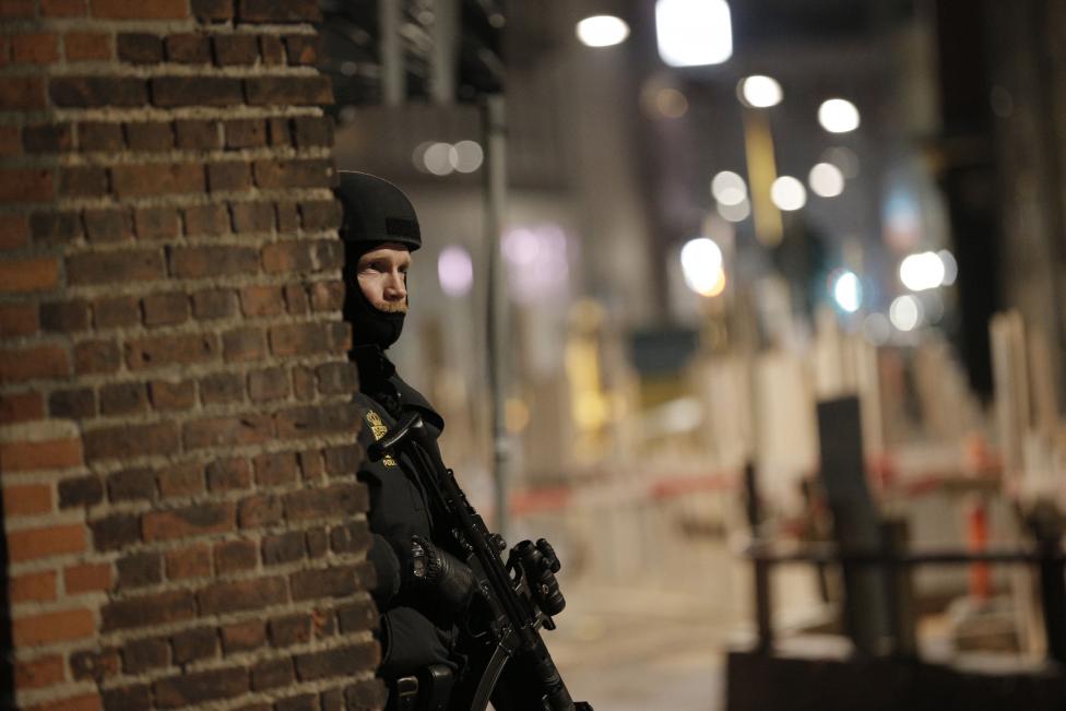 a policeman is seen along a street in central copenhagen early february 15 2015 following shootings at a synagogue in krystalgade photo reuters
