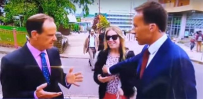 bbc reporter slapped on air for touching woman s breast