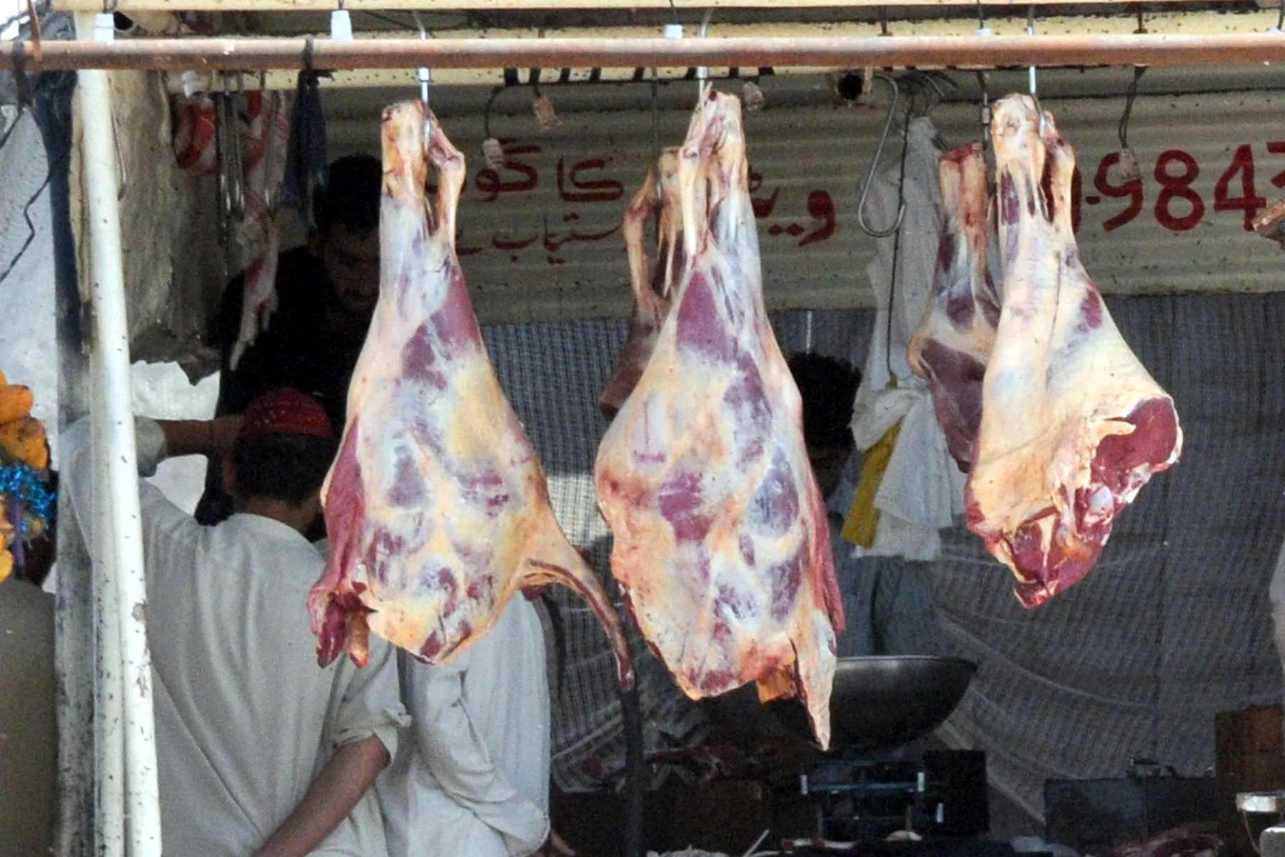 a butcher selling unhygienic meat photo express a butcher selling unhygienic meat photo express