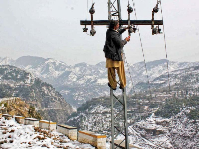 a worker fixes electricity lines damaged by gusty winds and heavy rainfall photo app a worker fixes electricity lines damaged by gusty winds and heavy rainfall photo app