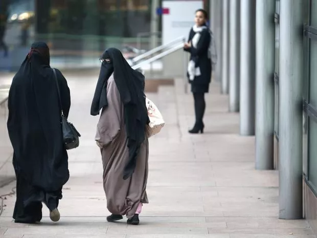 women covering their faces in public will be fined photo afp women covering their faces in public will be fined photo afp
