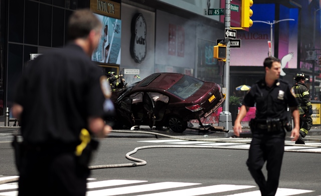 car crashes into crowd in new york leaving one dead 22 injured