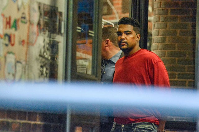 richard rojas is escorted from the 7th precinct by new york city police officers after being processed in connection with the speeding vehicle that struck pedestrians on a sidewalk in times square in new york city photo reuters