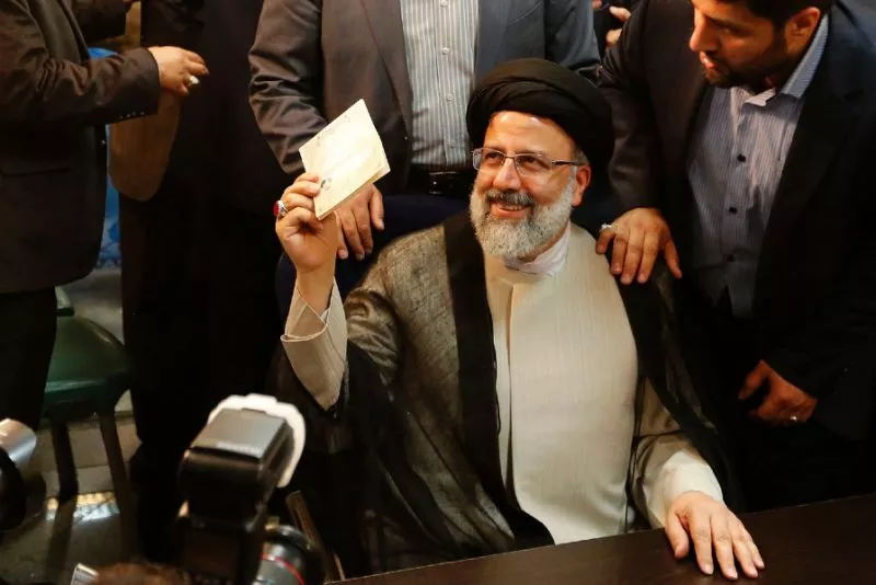 iranian cleric ebrahim raisi gestures after registering his candidacy for the upcoming presidential elections at the ministry of the interior in tehran on april 14 2017 photo afp iranian cleric ebrahim raisi gestures after registering his candidacy for the upcoming presidential elections at the ministry of the interior in tehran on april 14 2017 photo afp