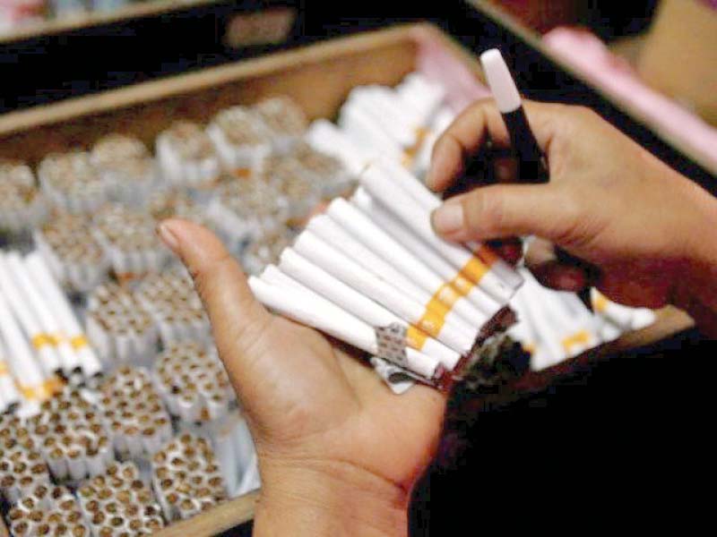 illicit cigarettes are easily available and openly sold across pakistan at prices as low as rs15 per pack photo reuters