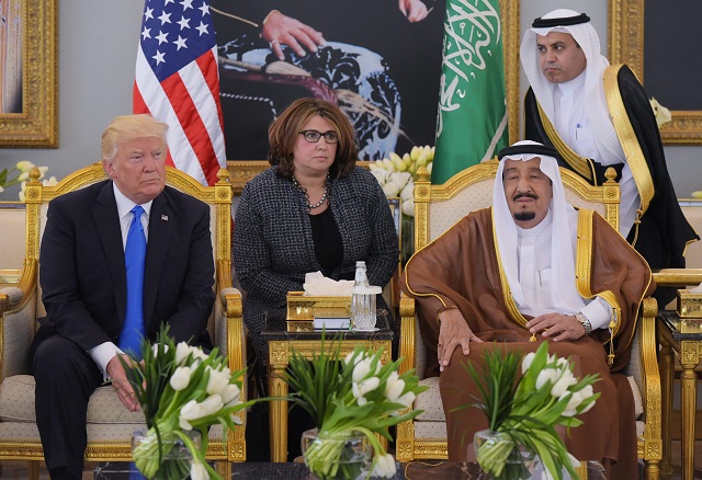 us president donald trump l and saudi arabia 039 s king salman bin abdulaziz al saud r stop for coffee in the terminal of king khalid international airport following trump 039 s arrival in riyadh on may 20 2017 photo afp