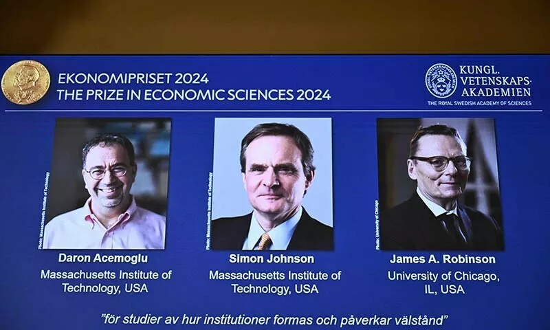 a screen shows the laureates l r turkish american daron acemoglu and british americans simon johnson and james robinson of the 2024 sveriges riksbank prize in economic sciences in memory of alfred nobel during the announcement by the royal swedish academy of sciences in stockholm sweden on october 14 2024 photo afp a screen shows the laureates l r turkish american daron acemoglu and british americans simon johnson and james robinson of the 2024 sveriges riksbank prize in economic sciences in memory of alfred nobel during the announcement by the royal swedish academy of sciences in stockholm sweden on october 14 2024 photo afp