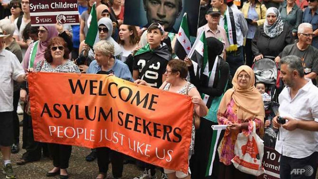 an estimated 50 000 asylum seekers flooded into australia on more than 800 boats over the previous five years photo afp an estimated 50 000 asylum seekers flooded into australia on more than 800 boats over the previous five years photo afp