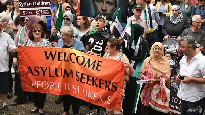 an estimated 50 000 asylum seekers flooded into australia on more than 800 boats over the previous five years photo afp an estimated 50 000 asylum seekers flooded into australia on more than 800 boats over the previous five years photo afp