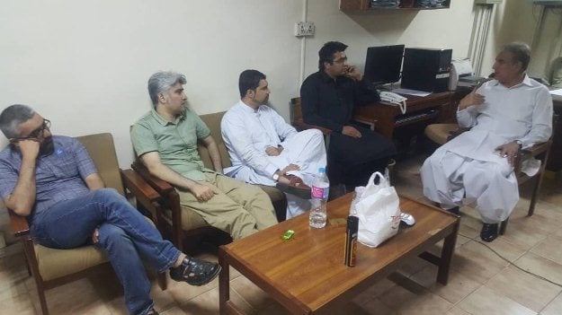 pti leader shah mehmood qureshi meeting with detained social media activists at the fia headquarters on sunday photo twitter