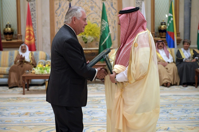 us secretary of state rex tillerson l exchanges a memorandum of understanding on countering financing of terrorism with saudi crown prince muhammad bin nayif bin abdulaziz al saud r in riyadh on may 21 2017 photo afp